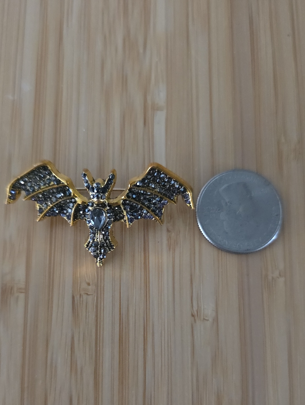 Gold-Tone Bat Brooch with Black Crystals